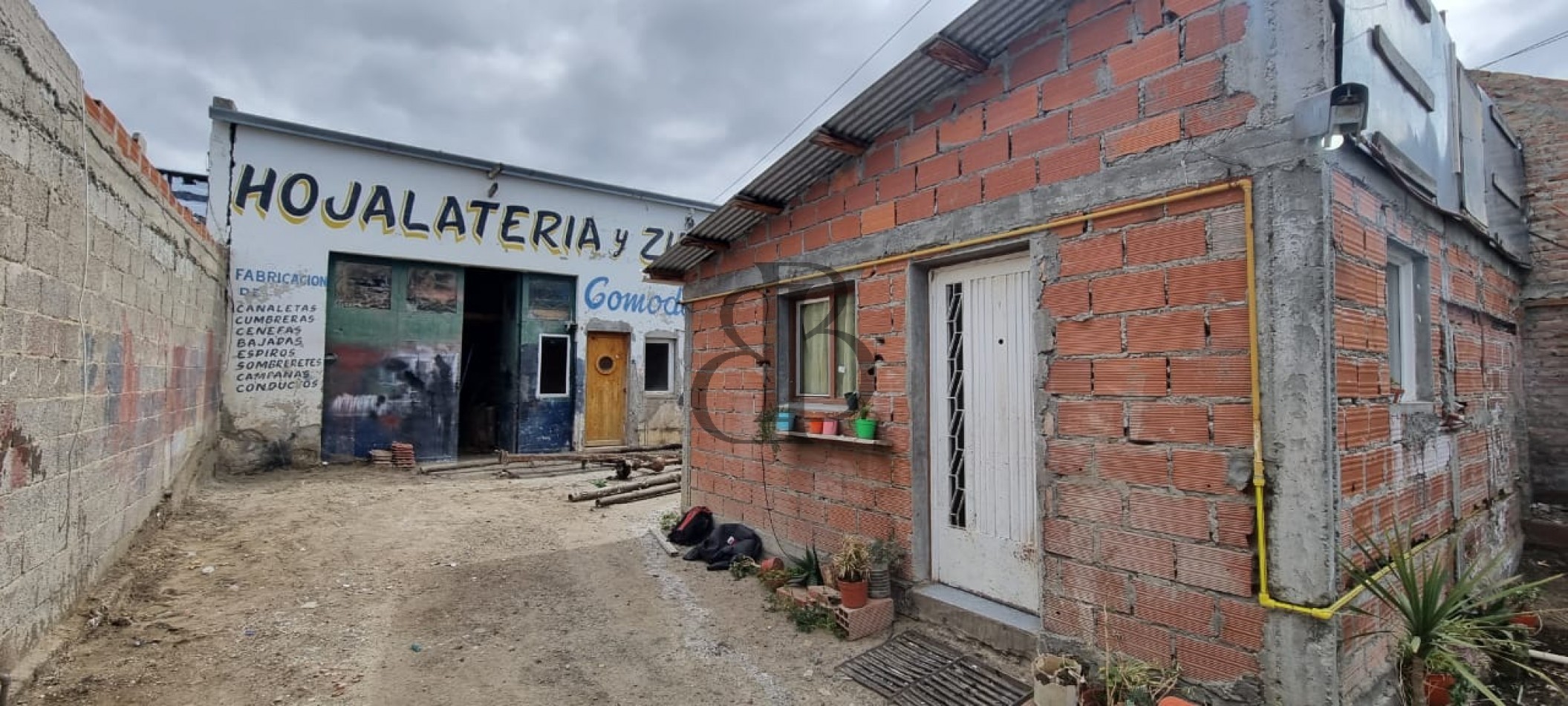 TERRENO CON MEJORA EN B° 9 DE JULIO