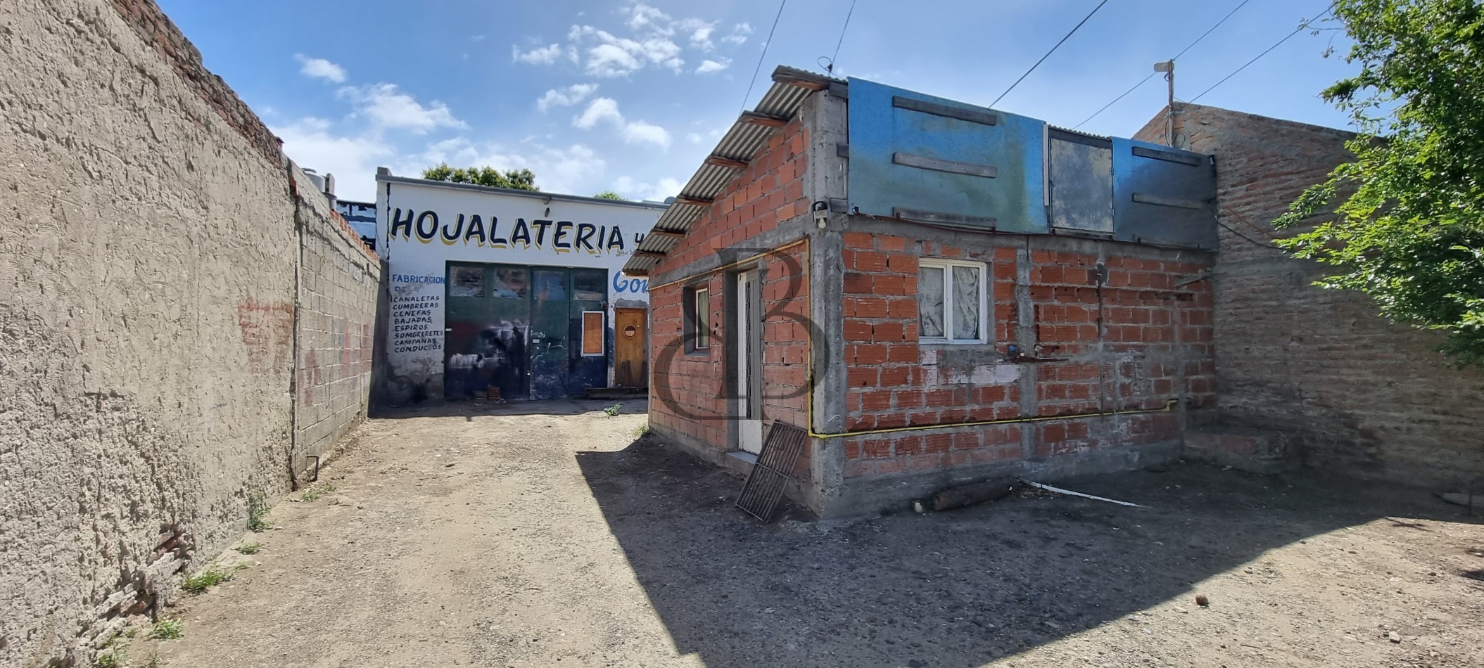 TERRENO CON MEJORA EN B° 9 DE JULIO